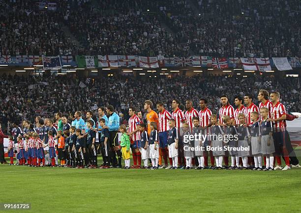 Players of Atletico Madrid and FC Fulham line up prior to the UEFA Europa League final match between Atletico Madrid and Fulham at HSH Nordbank Arena...