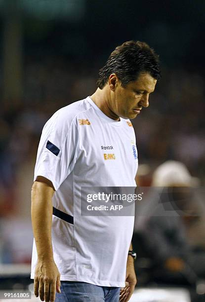 Cruzeiro's team coach Adilson Batista reacts during their Copa Libertadores quarterfinal football match against Sao Paulo in Belo Horizonte, Minas...