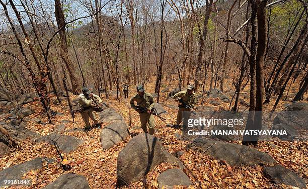 India-Maoist-unrest-military,FEATURE by Pratap Chakravarty Indian police commandos take part in an exercise at Combat Operating Base Arjun in Kanker...