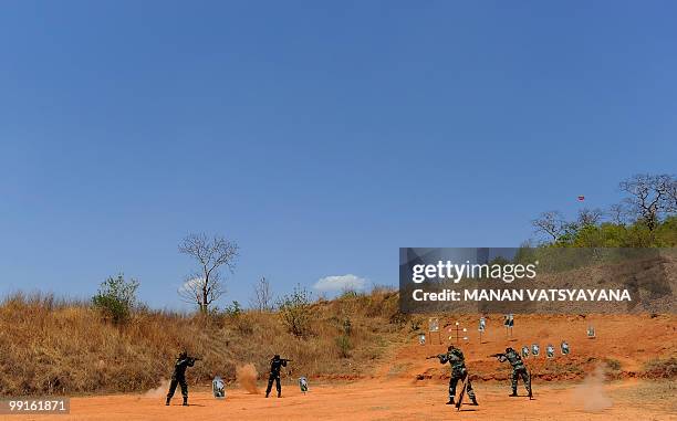 India-Maoist-unrest-military,FEATURE by Pratap Chakravarty Indian police commandos take part in an exercise at Combat Operating Base Arjun in Kanker...