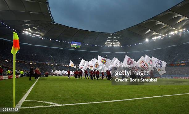 Flag bearers perform during the opening ceremony of the UEFA Europa League final match between Atletico Madrid and Fulham at HSH Nordbank Arena on...