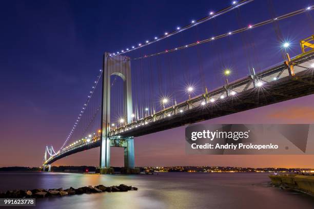 verrazano-narrows bridge at dusk - verrazano stock pictures, royalty-free photos & images