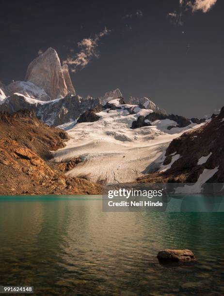 calm lake with snowy mountain in background, fitz roy, patagonia, argentina - lake argentina stock pictures, royalty-free photos & images
