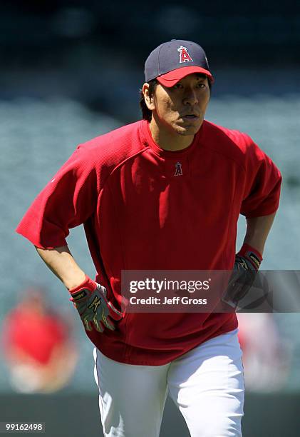 Hideki Matsui of the Los Angeles Angels of Anaheim looks on during batting practice prior to the start of the game against the Tampa Bay Rays at...