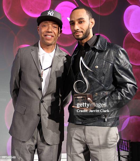 Russell Simmons presents Swizz Beatz with the 2010 SESAC Inspiration Award at the 2010 SESAC New York Music Awards at the IAC Building on May 12,...