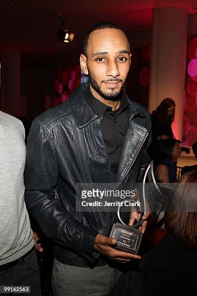 Swizz Beatz poses with the 2010 SESAC Inspiration Award he received at the 2010 SESAC New York Music Awards at the IAC Building on May 12, 2010 in...