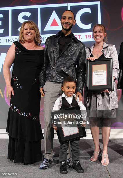 Swizz Beatz and his son Kasseem Dean, Jr. Pose for a photo with SESAC Executives at the 2010 SESAC New York Music Awards at the IAC Building on May...