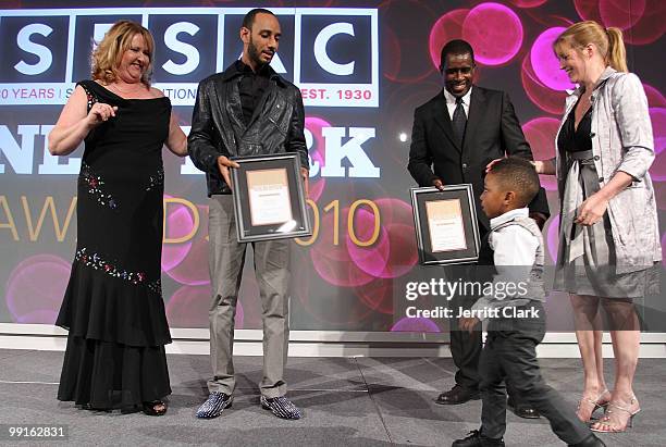 Swizz Beatz is joined by his son Kasseem Dean, Jr. On stage after receiving and award at the 2010 SESAC New York Music Awards at the IAC Building on...