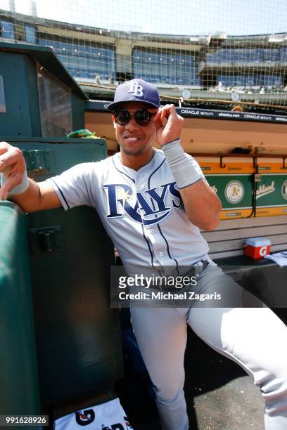 Carlos Gomez of the Tampa Bay Rays stands in the dugout prior to the game against the Oakland Athletics at the Oakland Alameda Coliseum on May 31,...