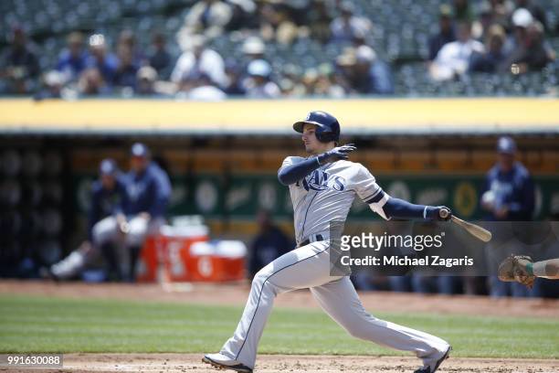 Daniel Robertson of the Tampa Bay Rays bats during the game against the Oakland Athletics at the Oakland Alameda Coliseum on May 31, 2018 in Oakland,...