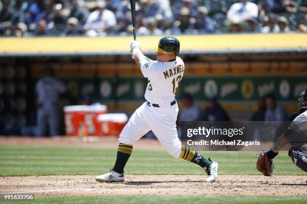 Bruce Maxwell of the Oakland Athletics bats during the game against the Tampa Bay Rays at the Oakland Alameda Coliseum on May 31, 2018 in Oakland,...