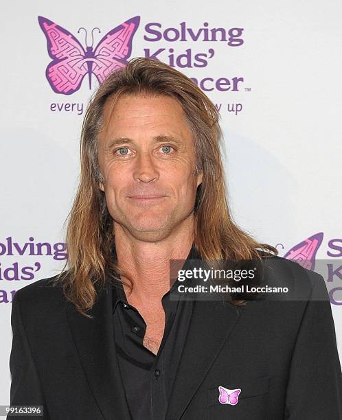 Photographer Russell James attends the Solving Kids' Cancer Spring Benefit at the American Museum of Natural History on May 12, 2010 in New York City.