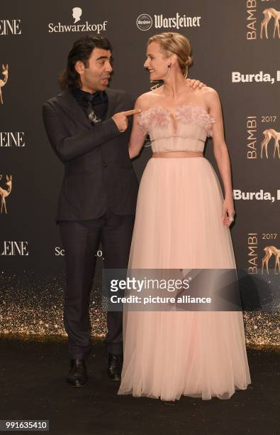 Actress Diane Kruger and the director of the film "In the Fade", Fatih Akin, arriving to the awards ceremony of the 69th edition of the Bambi media...