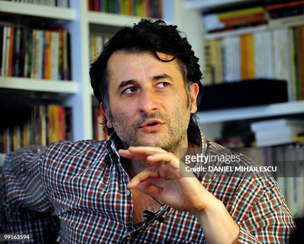 Romanian film director Cristi Puiu gestures during an interview with AFP in this photo taken in Bucharest on May 9, 2010. Puiu's new film "Aurora"...