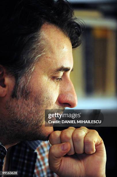 Romanian film director Cristi Puiu gestures during an interview with AFP in this photo taken in Bucharest on May 9, 2010. Puiu's new film "Aurora"...