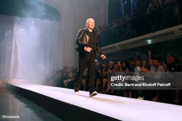 Stylist Jean-Paul Gaultier acknowledges the applause of the audience at the end of the Jean-Paul Gaultier Haute Couture Fall Winter 2018/2019 show as...