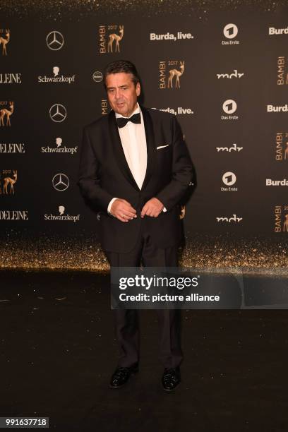 German Foreign Minister Sigmar Gabriel arrives to attend the awards ceremony of the 69th edition of the Bambi media prize in Berlin, Germany, 16...