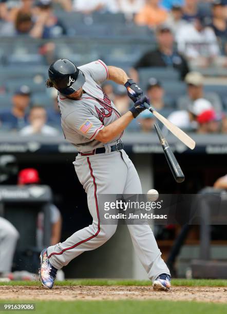 Charlie Culberson of the Atlanta Braves breaks his bat as he grounds out to end the fourth inning against the New York Yankees at Yankee Stadium on...