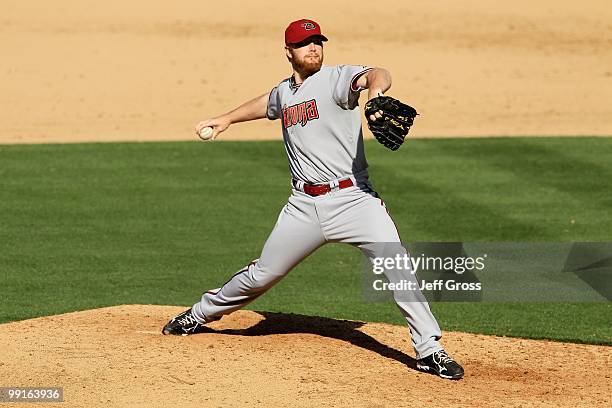 Blaine Boyer of the Arizona Diamondbacks pitches against the Los Angeles Dodgers at Dodger Stadium on April 13, 2010 in Los Angeles, California.