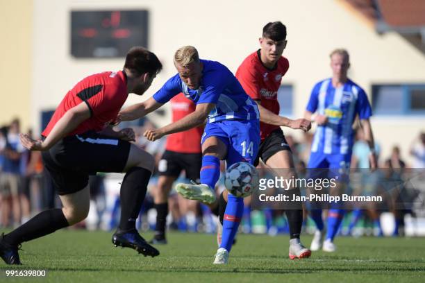 Pascal Koepke of Hertha BSC kicks the ball during the test match between RSV Eintracht Stahnsdorf and Hertha BSC on July 4, 2018 in Stahnsdorf,...