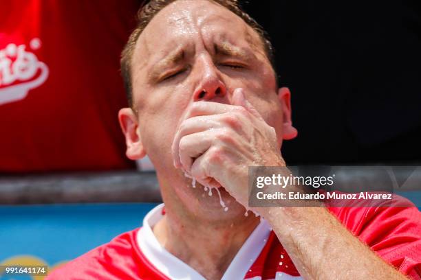 Joey Chestnut competes in the annual Nathan's Hot Dog Eating Contest on July 4, 2018 in the Coney Island neighborhood of the Brooklyn borough of New...