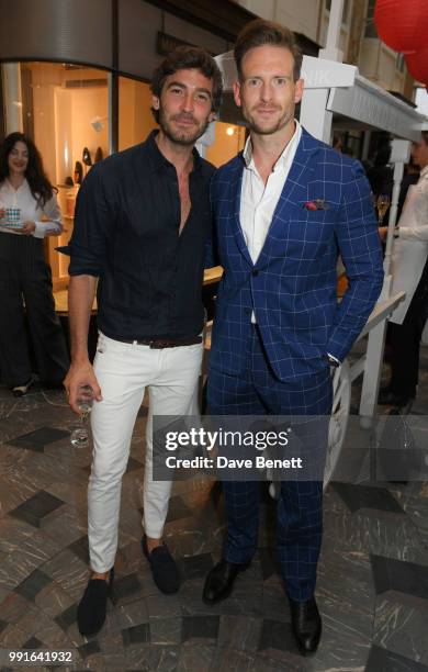 Robert Konjic and Craig McGinlay attend the Manolo Blahnik Colourful Garden Party at Burlington Arcade on July 4, 2018 in London, England.