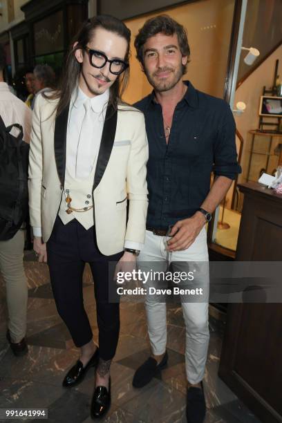 Joshua Kane and Robert Konjic attend the Manolo Blahnik Colourful Garden Party at Burlington Arcade on July 4, 2018 in London, England.