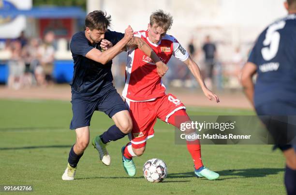 Right: Joshua Mees of 1 FC Union Berlin during the test match between Chemnitzer FC and Union Berlin at Werner-Seelenbinder-Sportplatz on July 4,...