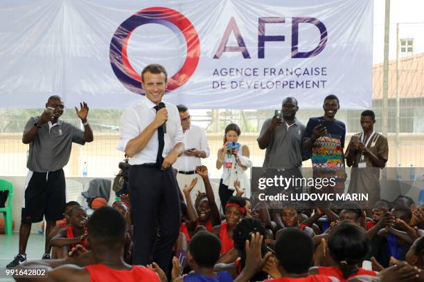 French President Emmanuel Macron delivers his speech during a meeting with former pro basketball players from NBA Africa and a training with young...