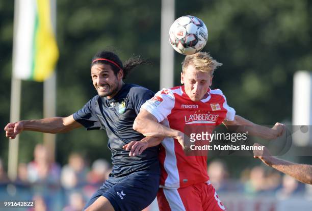 Right: Joshua Mees of 1 FC Union Berlin during the test match between Chemnitzer FC and Union Berlin at Werner-Seelenbinder-Sportplatz on July 4,...