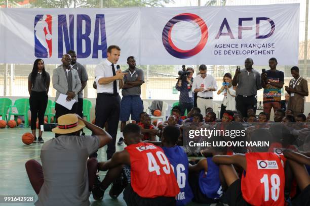 French President Emmanuel Macron delivers his speech during a meeting with former pro basketball players from NBA Africa and a training with young...