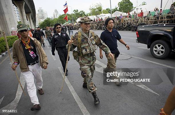 To go with profile story Thailand-politics-protest-SehDaeng by Patrick Falby In a picture taken on May 11 pro-red shirt Major-General Khattiya...