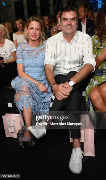 Andre Pollmann, Publisher Conde Nast , and guest attend the Riani show during the Berlin Fashion Week Spring/Summer 2019 at ewerk on July 4, 2018 in...