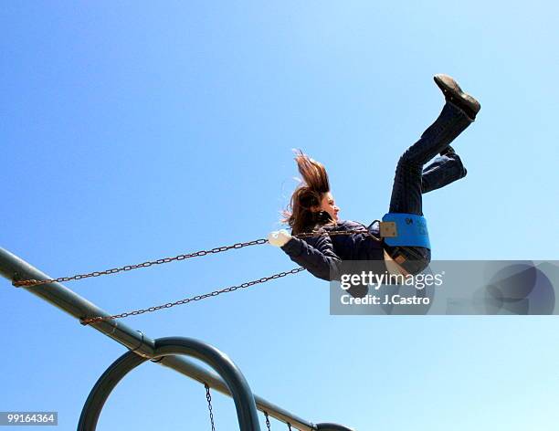 sunday morning - woman on swing stock-fotos und bilder