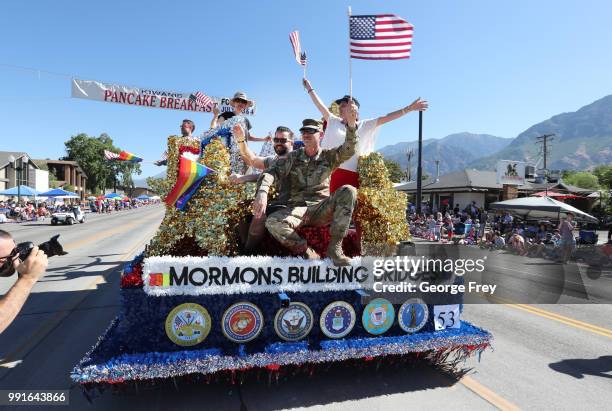 Float from the group "Mormon Building Bridges" makes it way down University Avenue as part of the Provo Freedom Festival Parade on July 4, 2018 in...