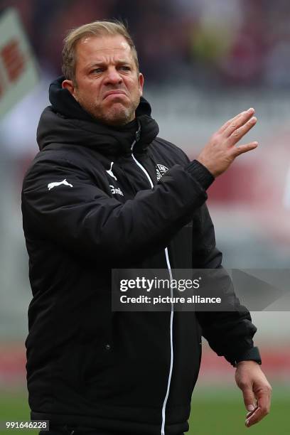 Kiel's head coach Markus Anfang gestures during the 2. German Bundesliga match between 1. FC Nuremberg and Holstein Kiel at the Max Morlock Stadium...