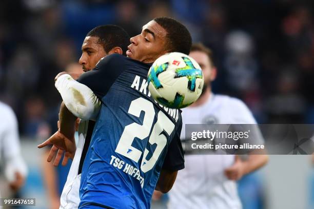 Hoffenheim's Kevin Akpoguma and Frankfurt's Sebastien Haller vie for the ball during the German Bundesliga match between 1899 Hoffenheim and...