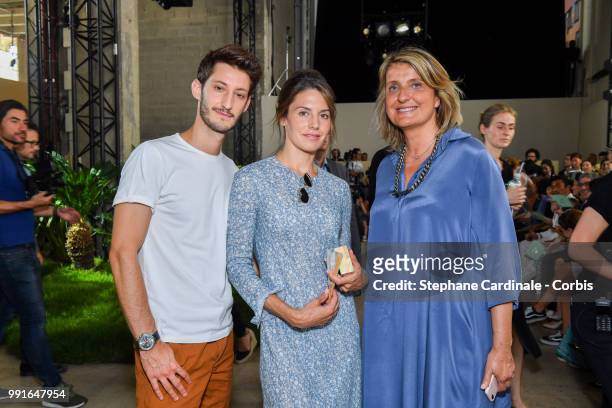 Pierre Niney, Natasha Andrews and Marie-Sabine Leclercq attend the Bonpoint Haute Couture Fall/Winter 2018-2019 show as part of Haute Couture Paris...