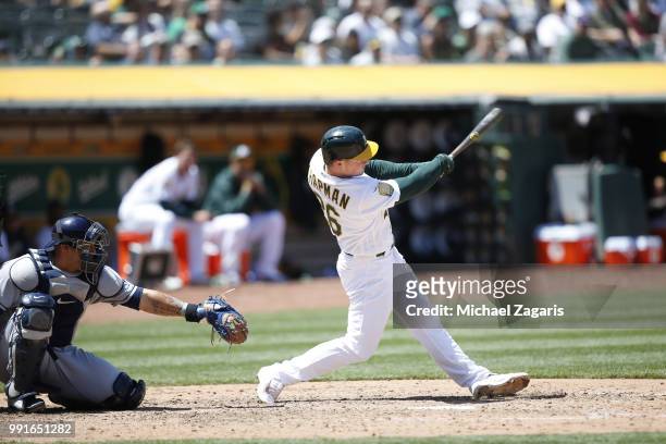 Matt Chapman of the Oakland Athletics hits a home run during the game against the Tampa Bay Rays at the Oakland Alameda Coliseum on May 31, 2018 in...