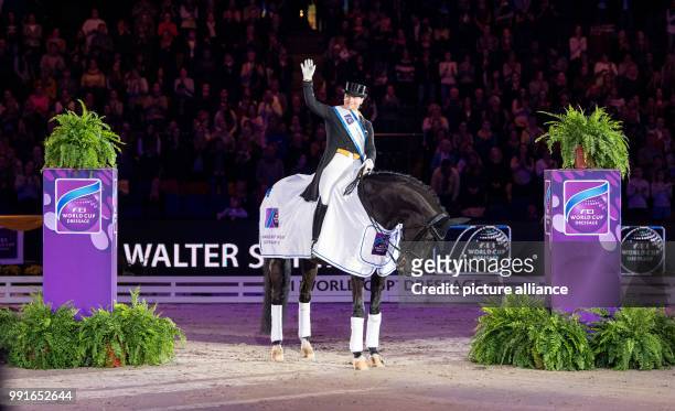 The German dressage rider Isabell Werth sitting on her horse Weihegold OLD during the award ceremony of the 33rd horse show for the World Cup...