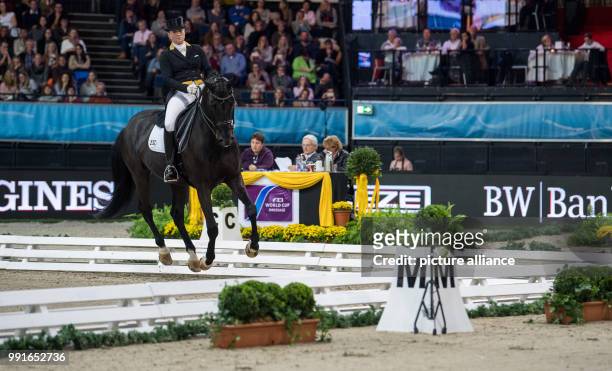 The German dressage rider Isabell Werth riding on her horse Weihegold OLD during the award ceremony of the 33rd horse show for the World Cup...