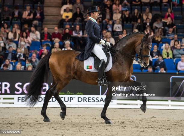The dressage rider Daniel Pinto from Portugal riding his horse Santurion de Massa during the 33rd international horse show for the World Cup...