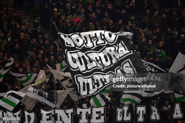 Moenchengladbach's fans wave a flag saying 'Sottocultura Ultras' during the German Bundesliga soccer match between Hertha BSC and Borussia...