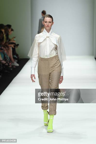 A model walks the runway at the Danny Reinke show during the Berlin ...