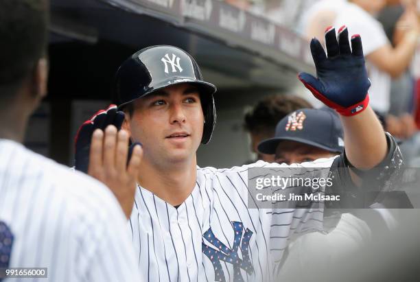 Kyle Higashioka of the New York Yankees celebrates his fourth inning home run against the Atlanta Braves at Yankee Stadium on July 4, 2018 in the...