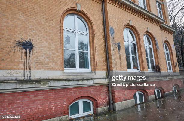 The building of the public prosecutor's office stained with black paint and with some of its windows broken in Hamburg, Germany, 19 November 2017....