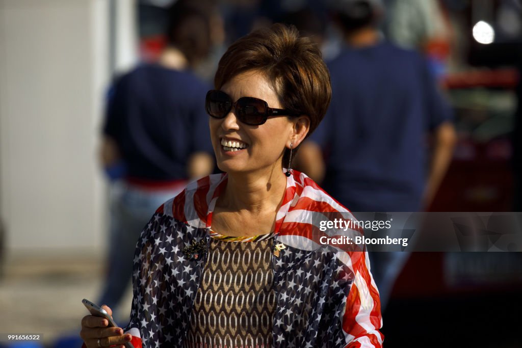 California Congressional Candidates Gil Cisneros And Kim Young Attend July 4th Parade