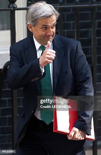 British Liberal Democrat Energy and Climate Change Secretary, Chris Huhne, arrives to attend the first Cabinet meeting of the new...