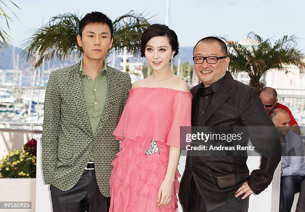 Hao Qin, Fan BingBing and Xiaoshuai Wang attend the 'Chongqing Blues' Photocall at the Palais des Festivals during the 63rd Annual Cannes Film...