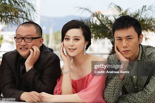 Xiaoshuai Wang, Fan BingBing and Hao Qin attend the 'Chongqing Blues' Photocall at the Palais des Festivals during the 63rd Annual Cannes Film...